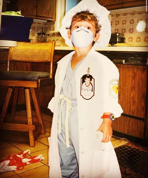 Doctor Nick dressed as a doctor as a child