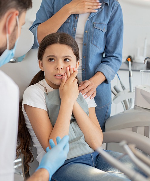 a child suffering from a toothache