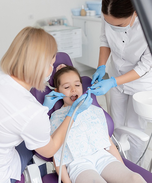 a child receiving dental treatment