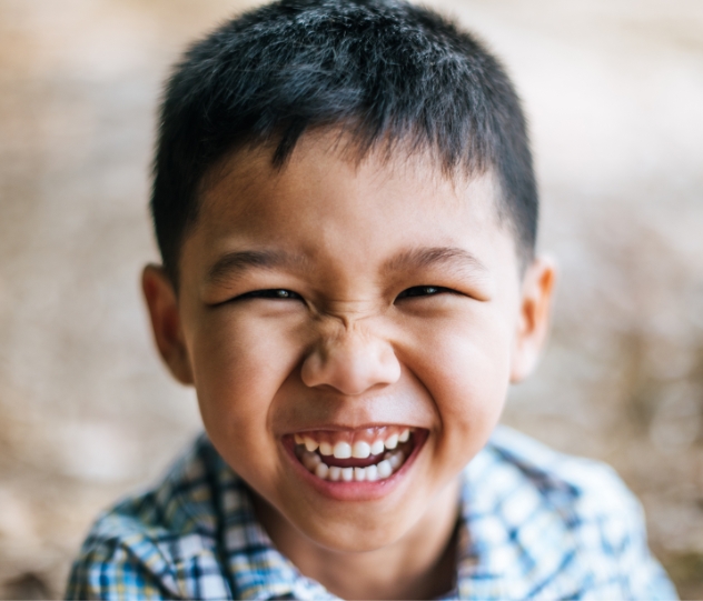 Young child with healthy smile after consultation and orthodontic referral