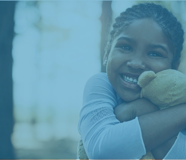 Young child smiling after pediatric dental visit