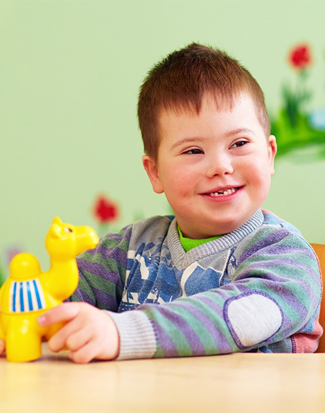 Young boy smiling after special needs dentistry in Buffalo Grove