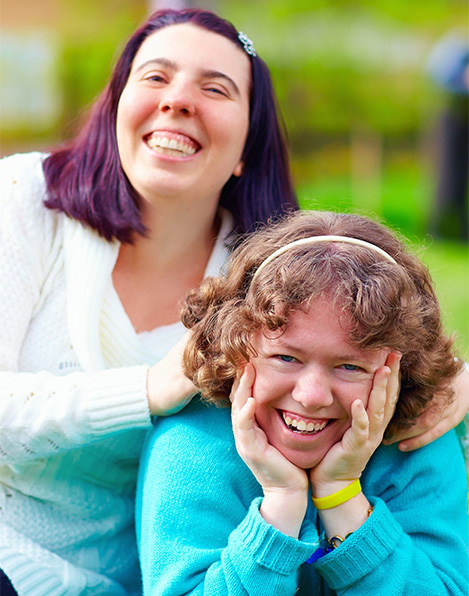 Girls smiling after visiting special needs dentist in Buffalo Grove